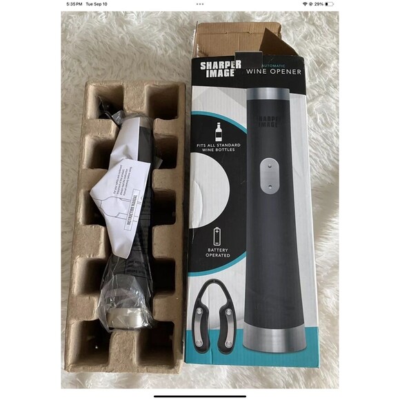 This Sharper Image handheld bottle opener is a must-have for any occasion. With - Picture 2 of 9